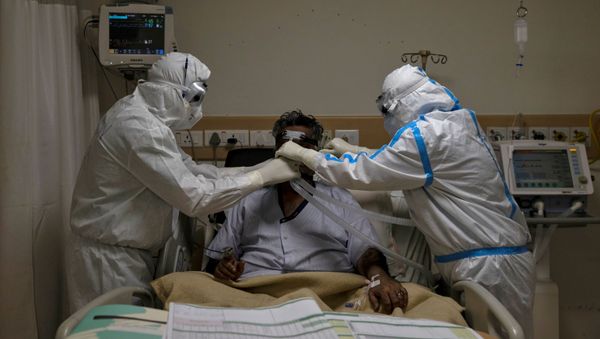 Пациент с COVİD-19, фото из архива - Sputnik Азербайджан